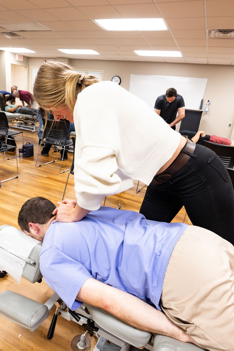 female student working with male student in DC class