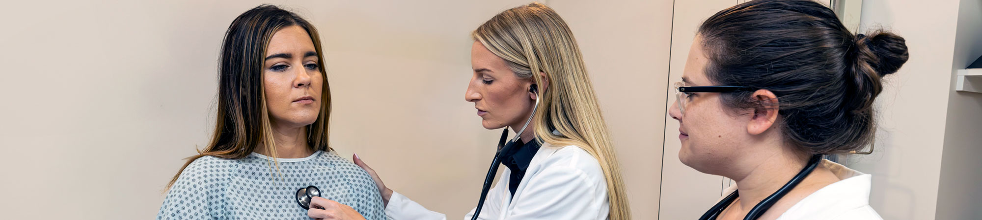 student being checked out in NUHS clinic