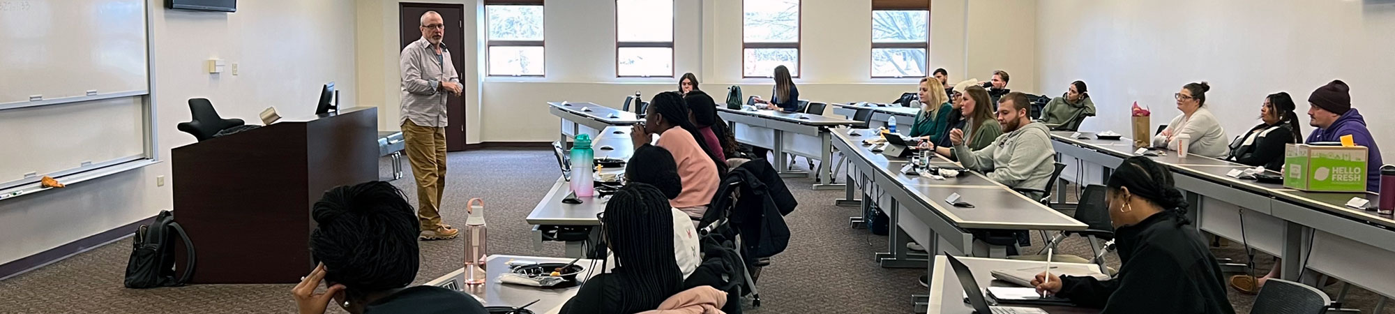 continued education instructor with in classroom with students