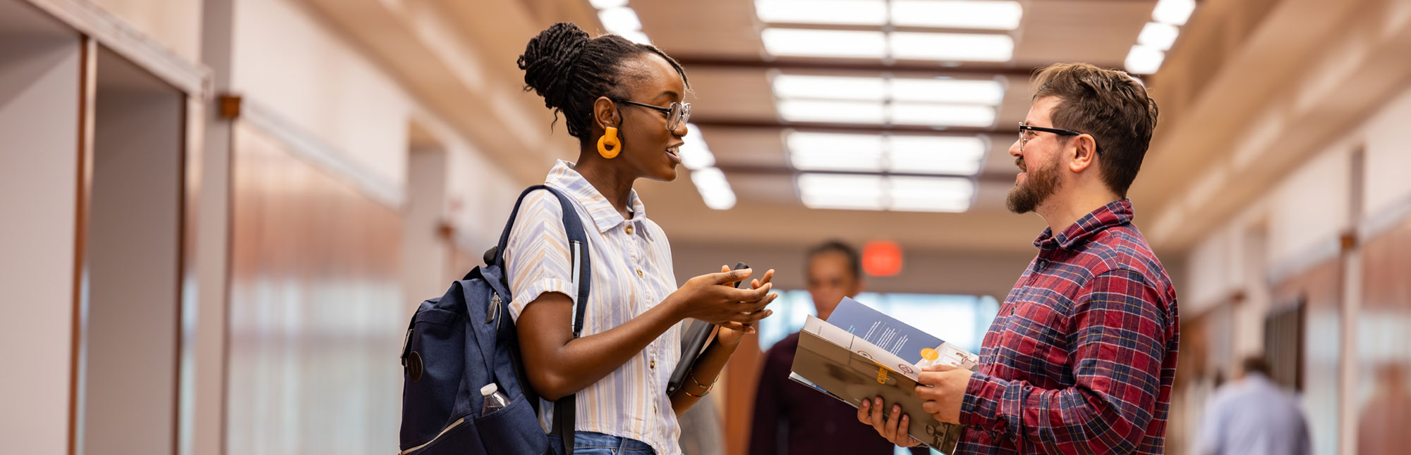 transfer student taking a tour of Janse hallway